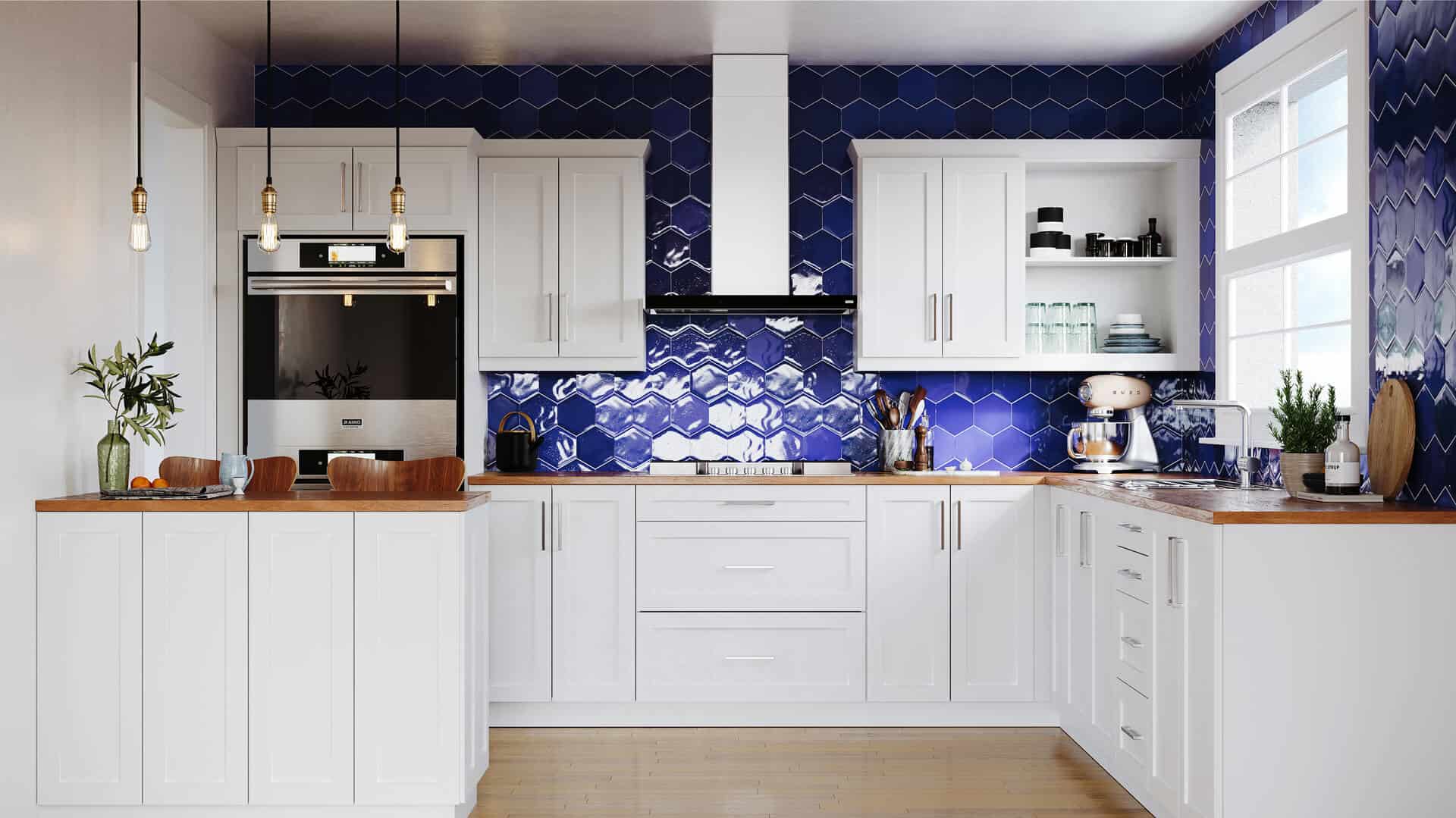 A modern kitchen with white cabinets, a wooden countertop sourced from a local lumber supplier, and a blue geometric tile backsplash. Appliances include a built-in oven, stovetop, and a mixer on a counter next to a window.